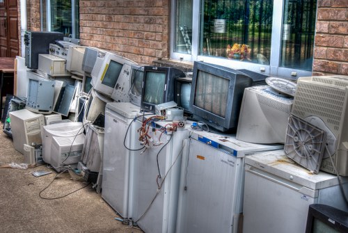Team handling office clearance with equipment in Wimbledon