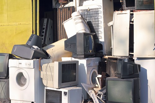 Professional team assessing loft clearance in Wimbledon