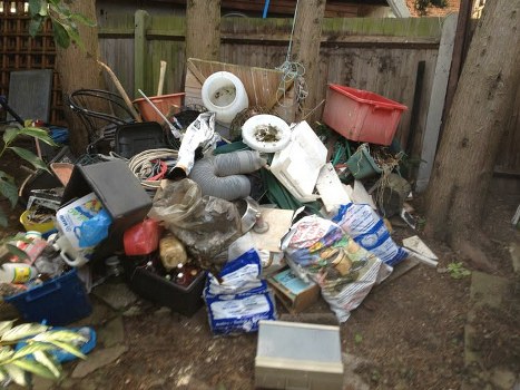 Protected skip ensuring waste remains contained from weather