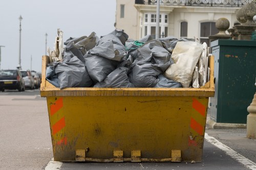 Skip container placed in a Wimbledon garden for waste disposal